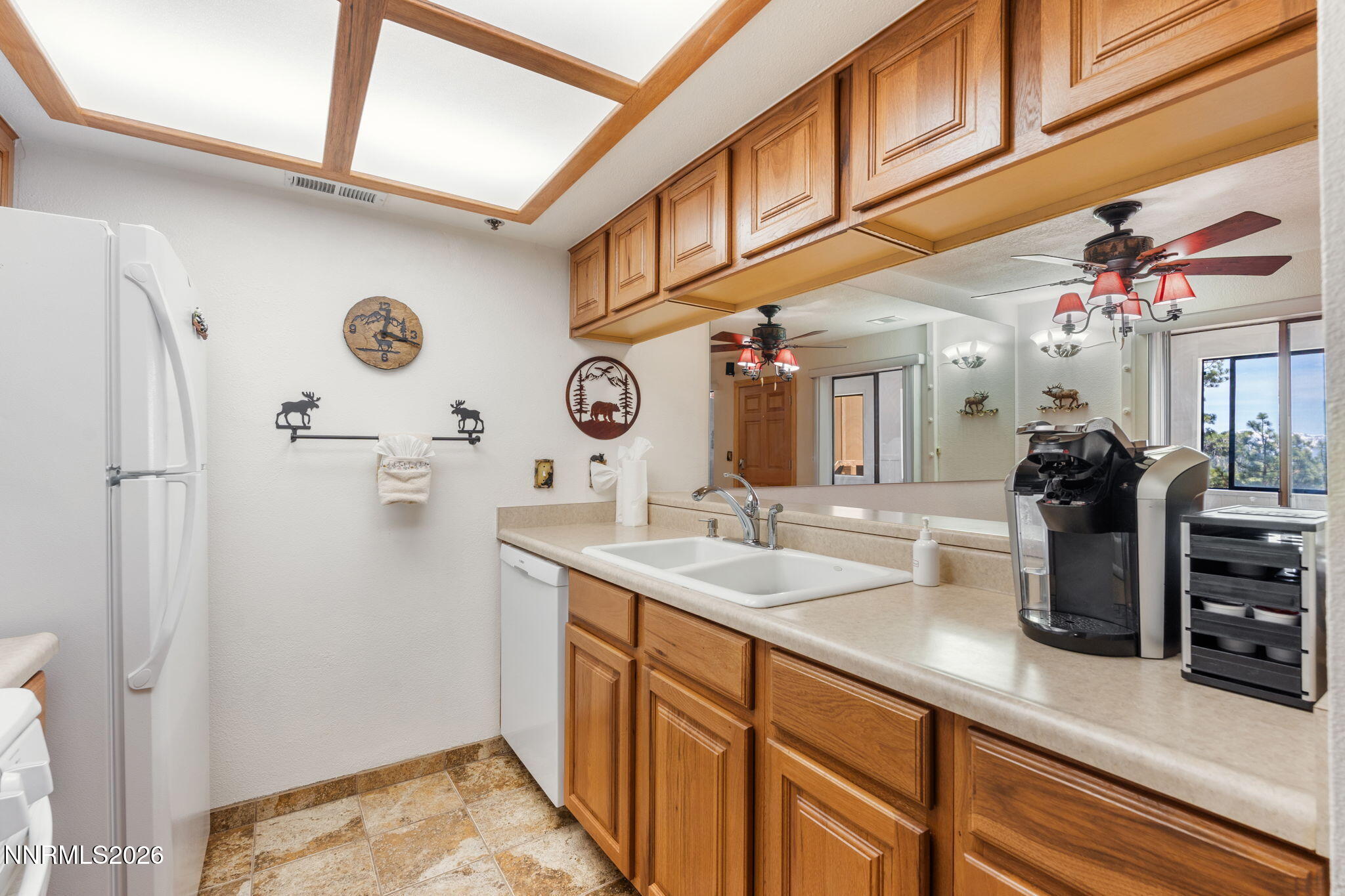 759 Boulder Court, Unit F Stateline, NV 89449 - Photo 11 of 36 a bathroom with a sink a mirror and shower