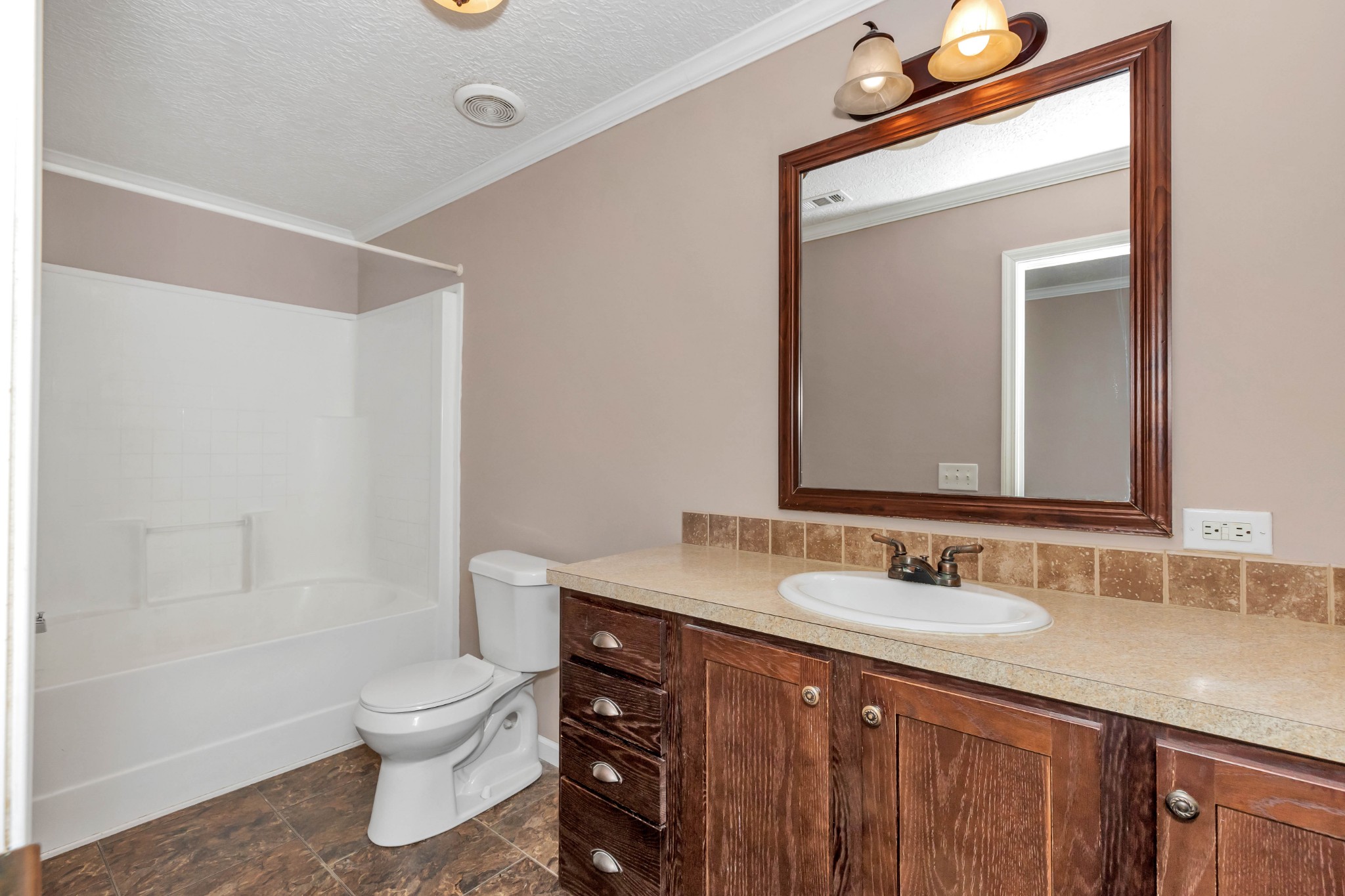 911 Poplar Hill Road Prospect, TN 38477 - Photo 18 of 33 a bathroom with a sink a toilet and a mirror