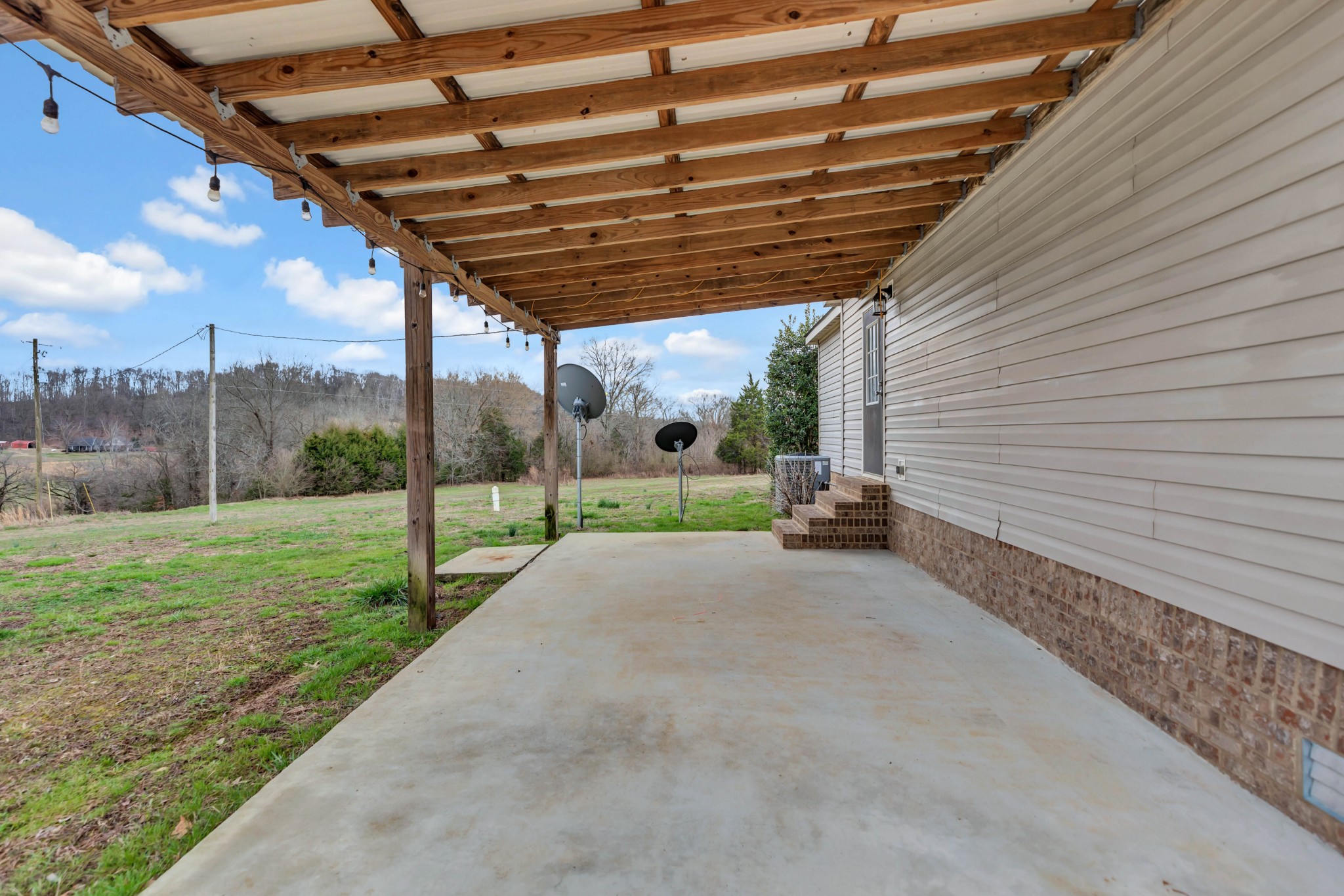 911 Poplar Hill Road Prospect, TN 38477 - Photo 24 of 33 a view of a backyard of the house