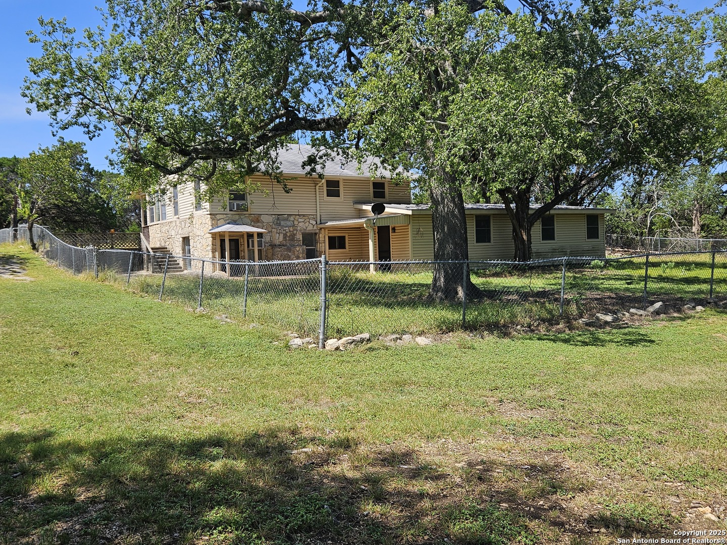 29 Green Cedar Road Boerne, TX 78006 - Photo 11 of 39 a view of a house with a yard