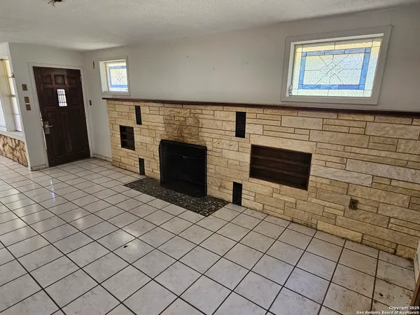 an empty room with windows