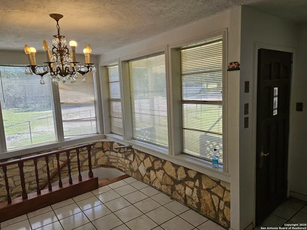 a view of a room with windows