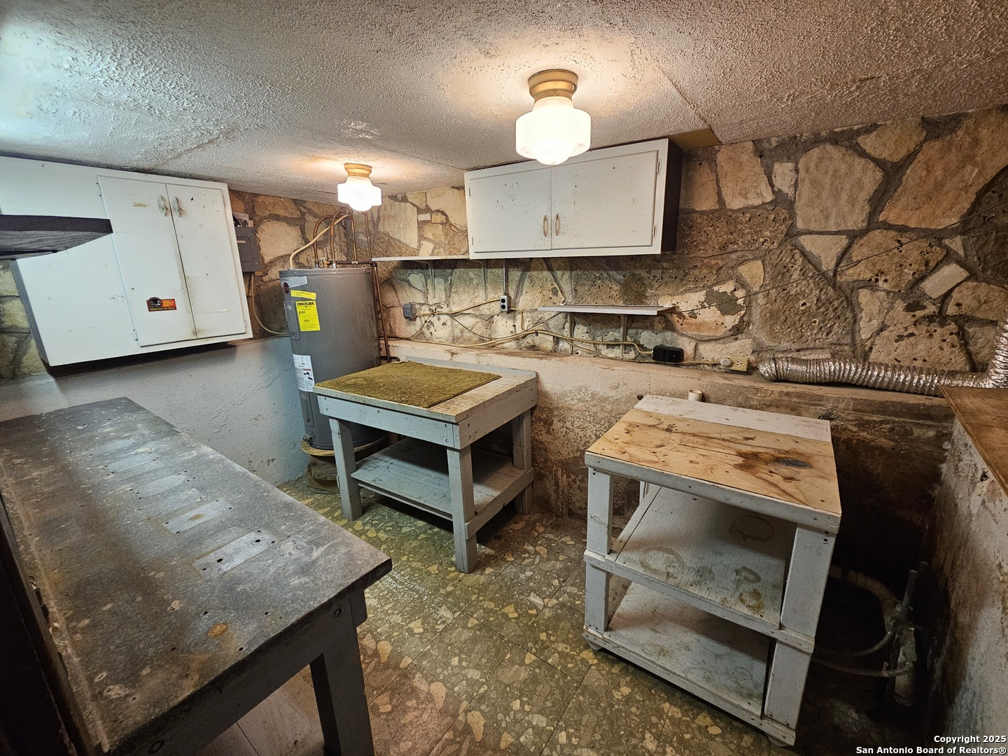 29 Green Cedar Road Boerne, TX 78006 - Photo 26 of 39 a kitchen with a stove and a wooden floor