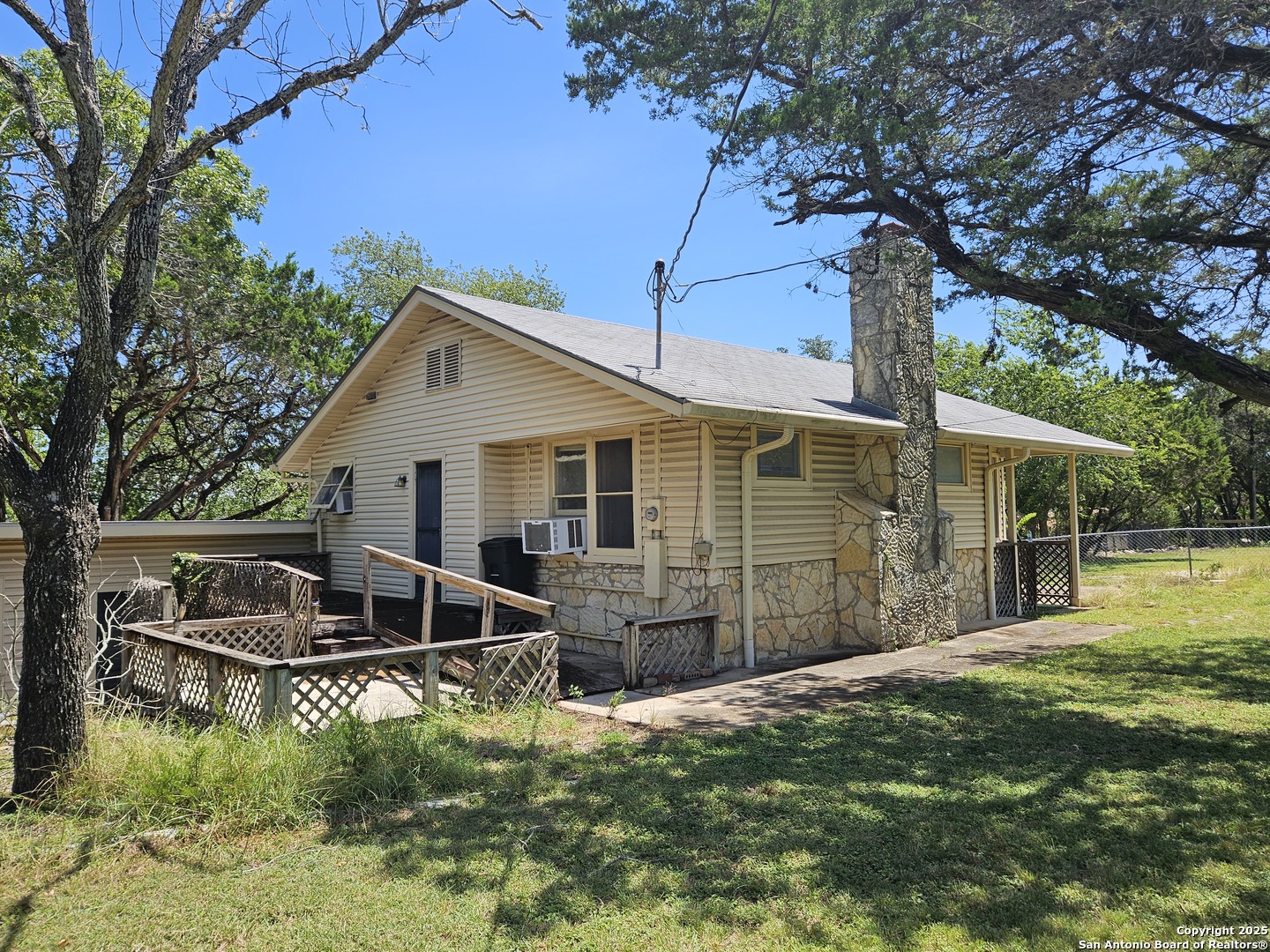 29 Green Cedar Road Boerne, TX 78006 - Photo 6 of 39 a backyard of a house with table and chairs