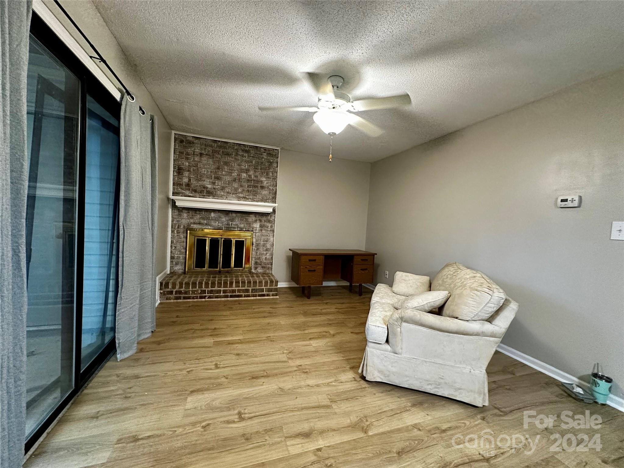 11015 Running Ridge Rd. Charlotte, NC 28226 - Photo 13 of 20 a living room with furniture