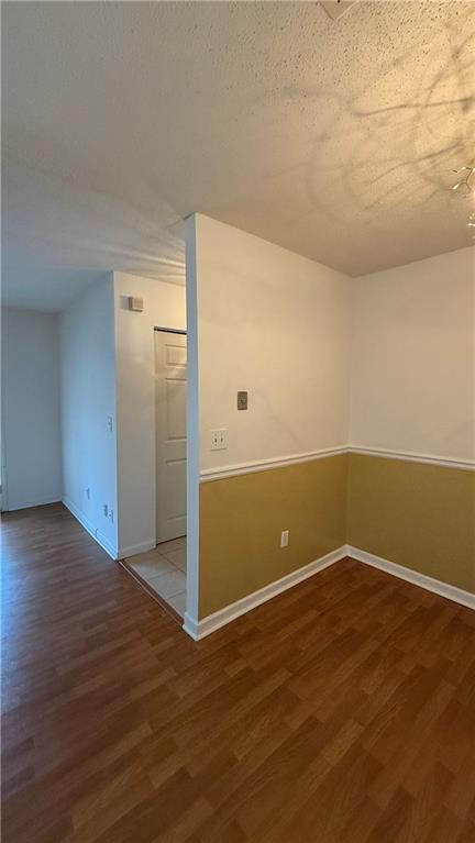 3595 Woodbriar Circle, Unit N Tucker, GA 30084 - Photo 14 of 39 wooden floor in an empty room