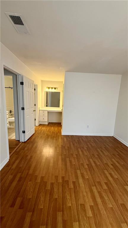 3595 Woodbriar Circle, Unit N Tucker, GA 30084 - Photo 21 of 39 a view of empty room with wooden floor