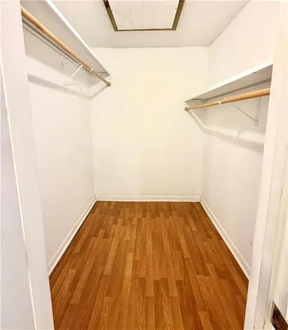 a bathroom with a toilet and a bathtub