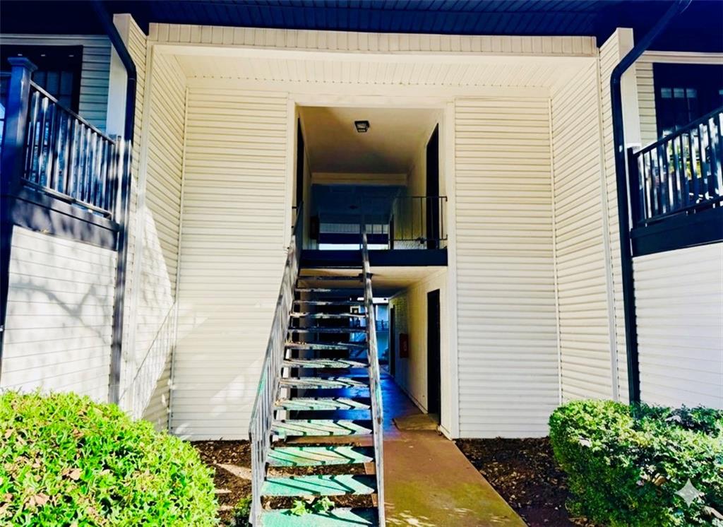 3595 Woodbriar Circle, Unit N Tucker, GA 30084 - Photo 38 of 39 a view of a house with potted plants