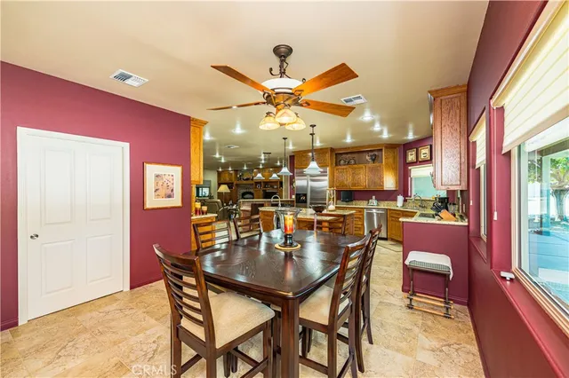 a work room with furniture and a window