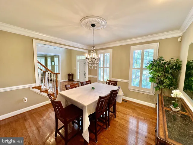 a kitchen with granite countertop a stove and cabinets