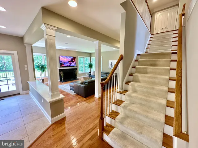 a view of a two chairs in the balcony