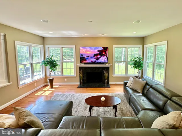 a view of a patio with wooden floor