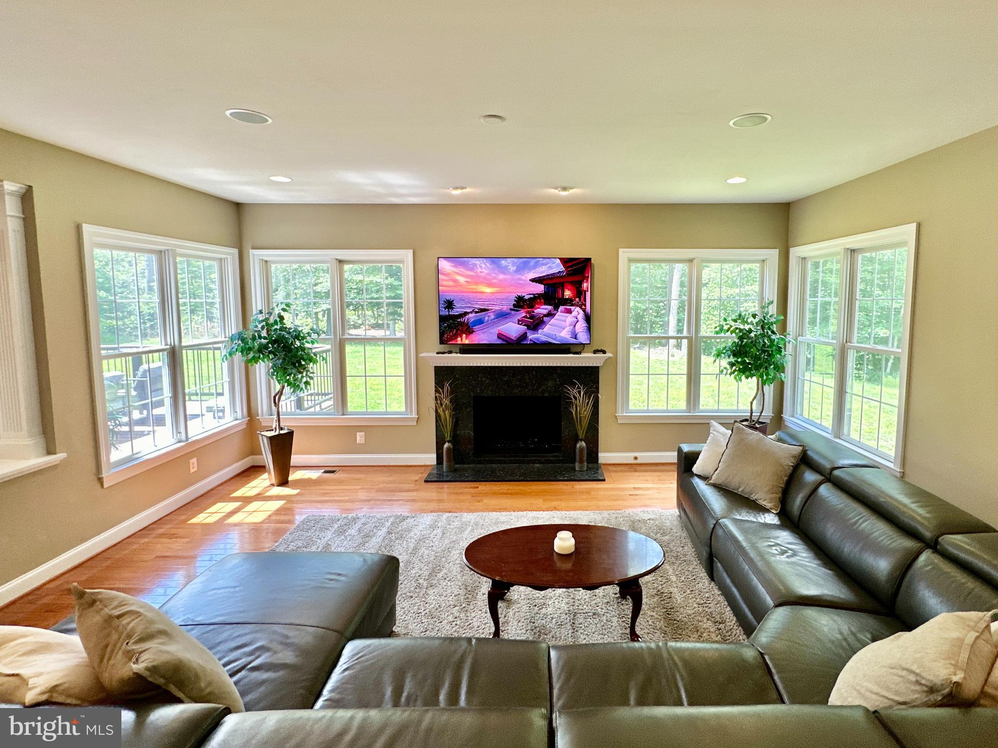 513 Broad Stream Lane Riva, MD 21140 - Photo 22 of 67 a living room with furniture and a fireplace