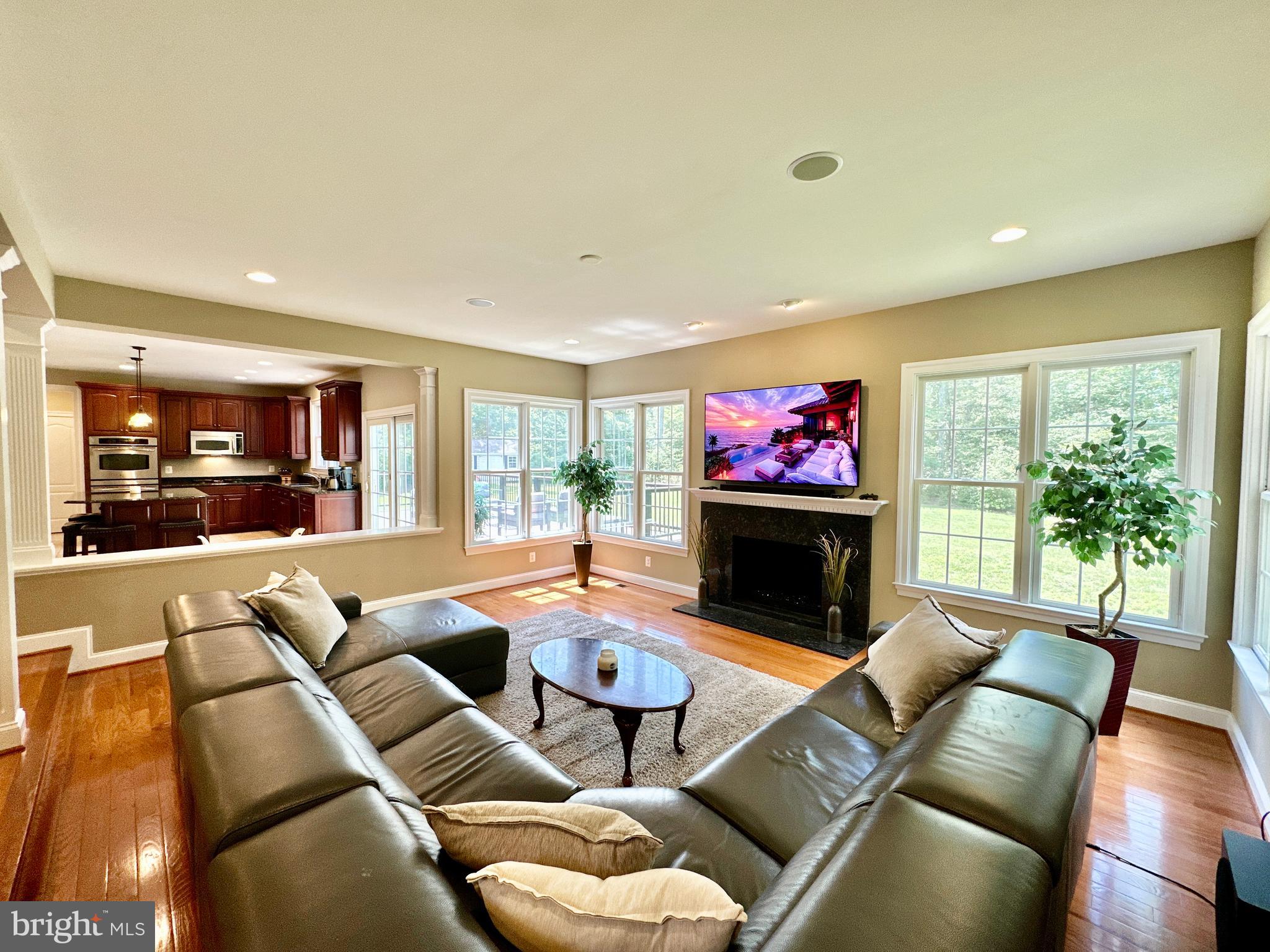 513 Broad Stream Lane Riva, MD 21140 - Photo 23 of 67 a living room with furniture flat screen tv and a large window