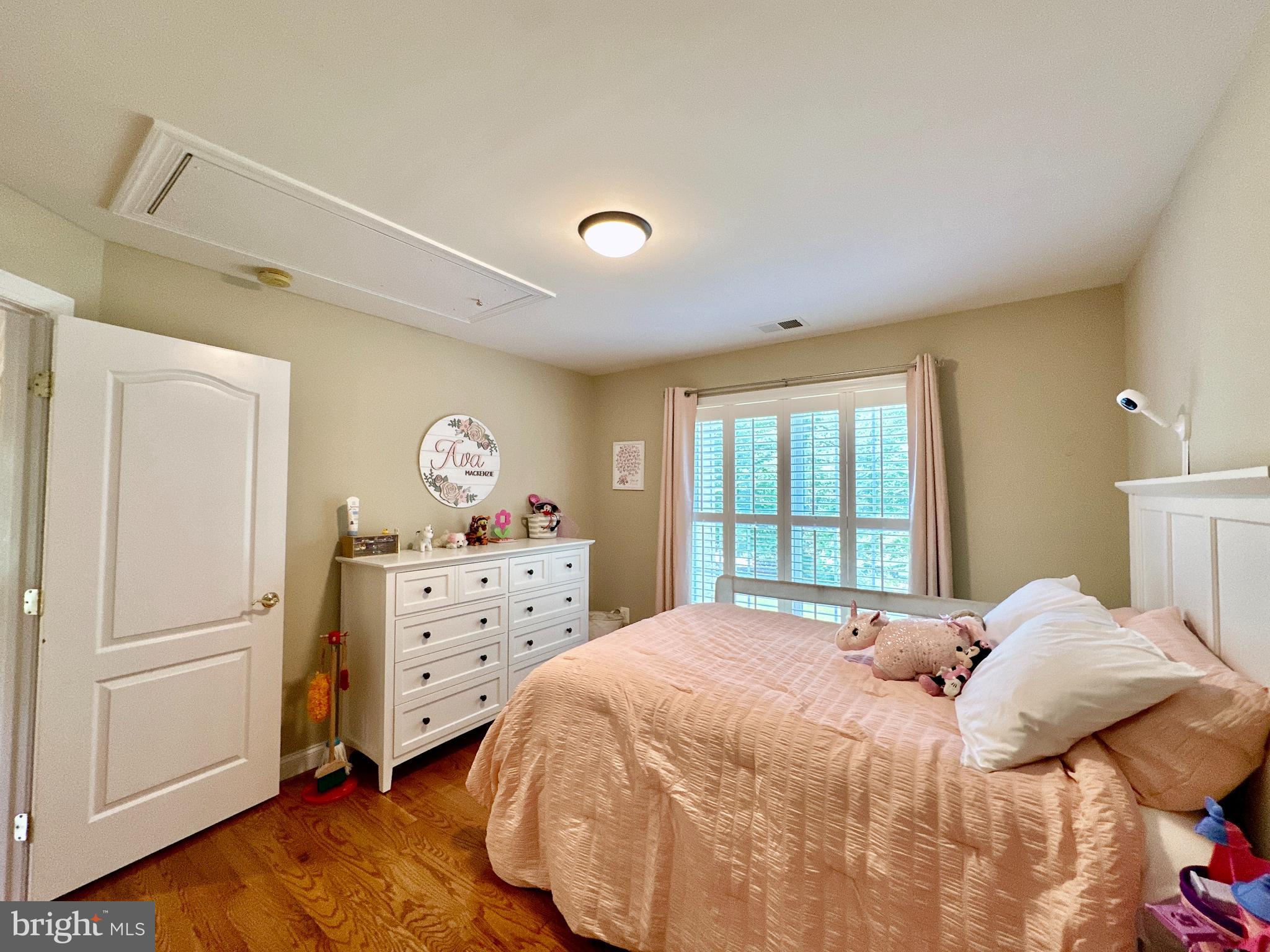 513 Broad Stream Lane Riva, MD 21140 - Photo 44 of 67 a bedroom with a bed and a window