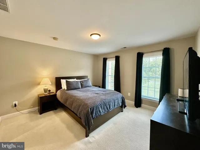 a view of a workspace with furniture