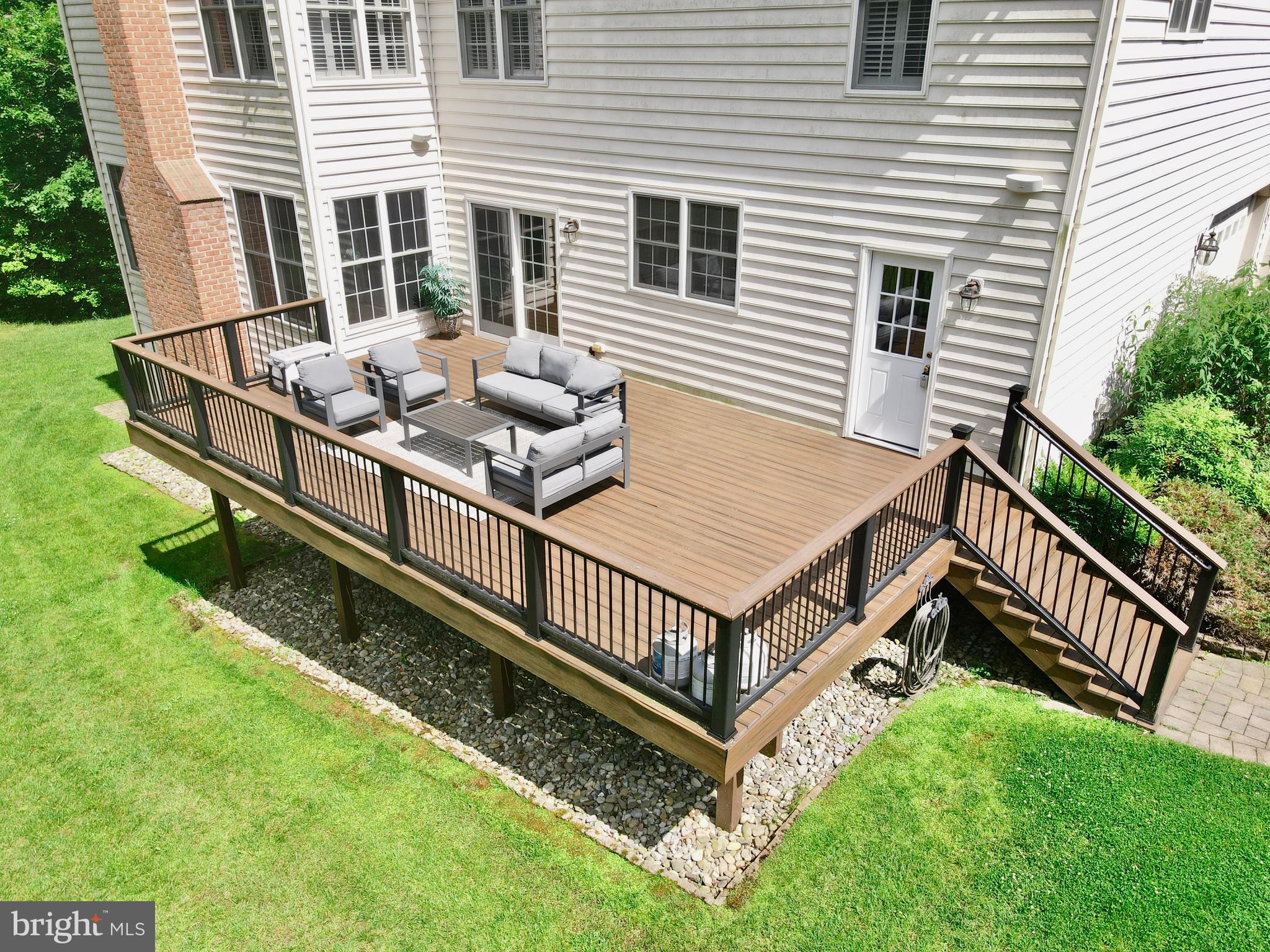 513 Broad Stream Lane Riva, MD 21140 - Photo 5 of 67 a view of backyard with deck and outdoor seating