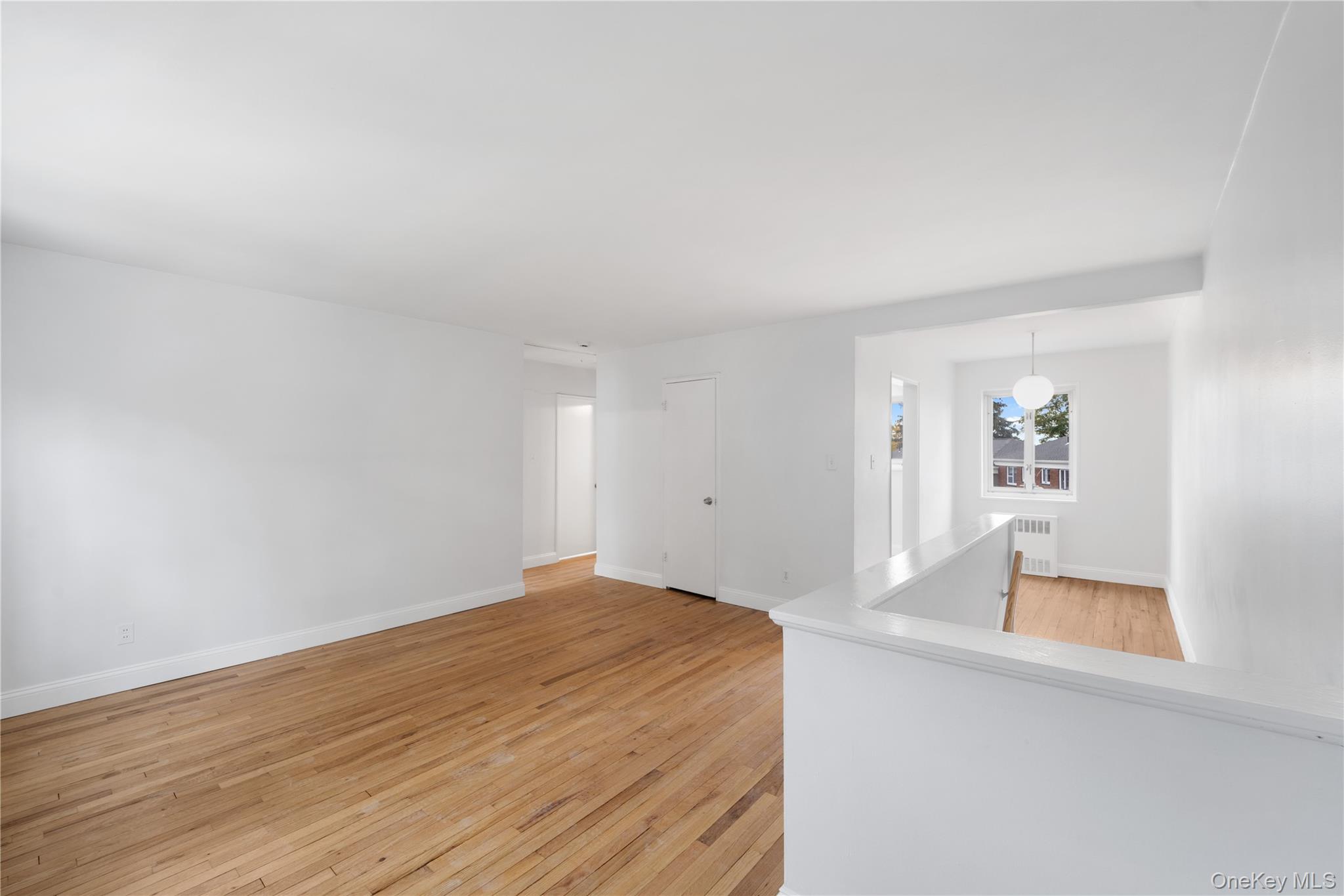 221-26 Manor Road, Unit 116 Queens, NY 11427 - Photo 10 of 19 wooden floor in a room