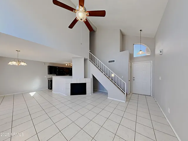 a view of an entryway with a chandelier