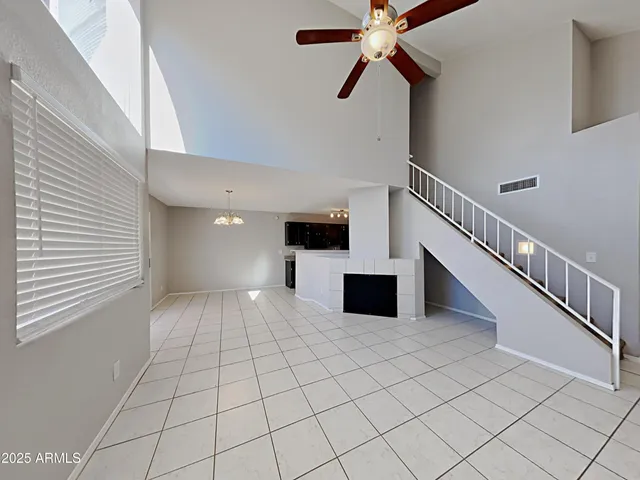 a view of a livingroom with a kitchen
