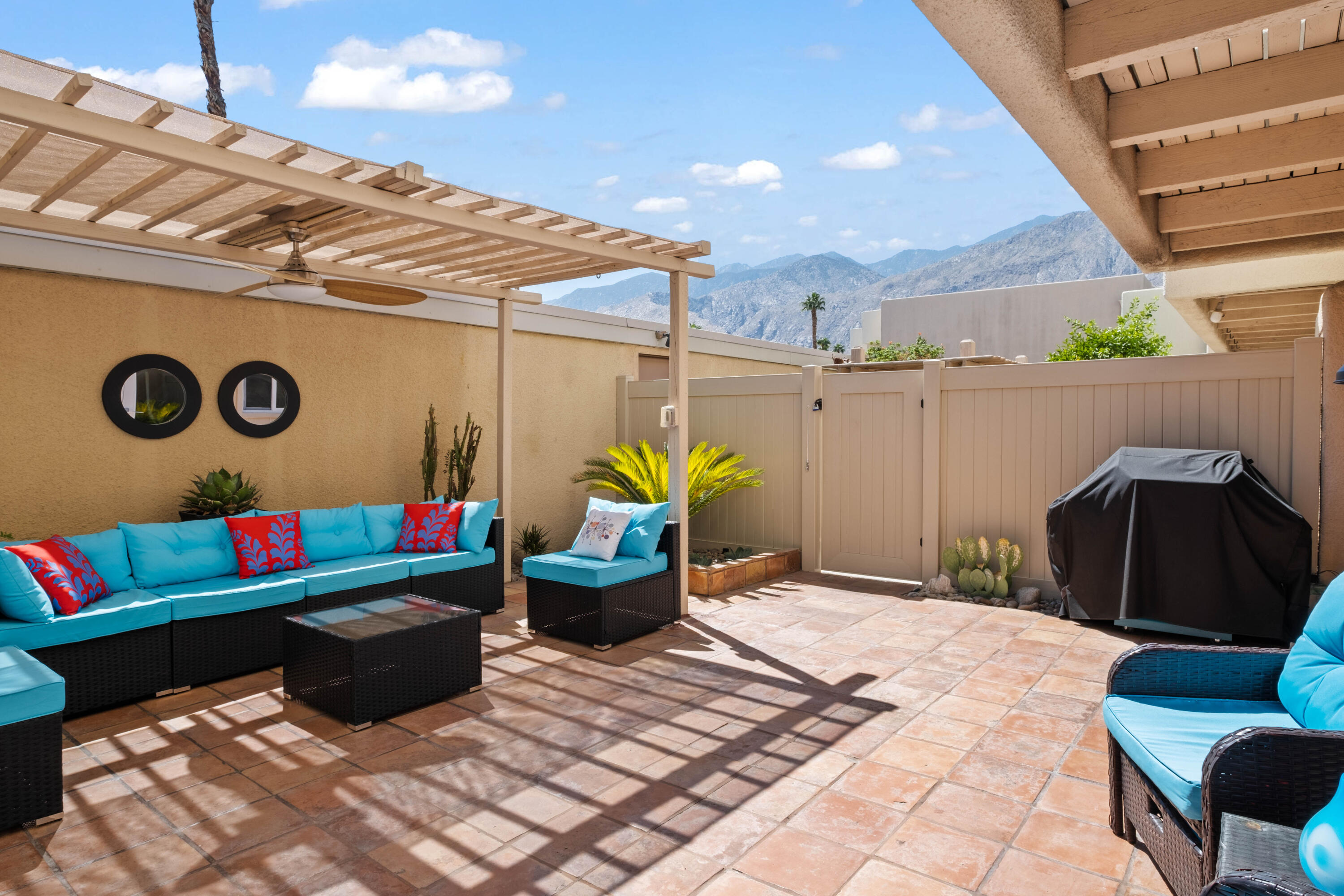 1268 Ramon Road, Unit 61 Palm Springs, CA 92264 - Photo 13 of 18 a outdoor space with patio couch and potted plant