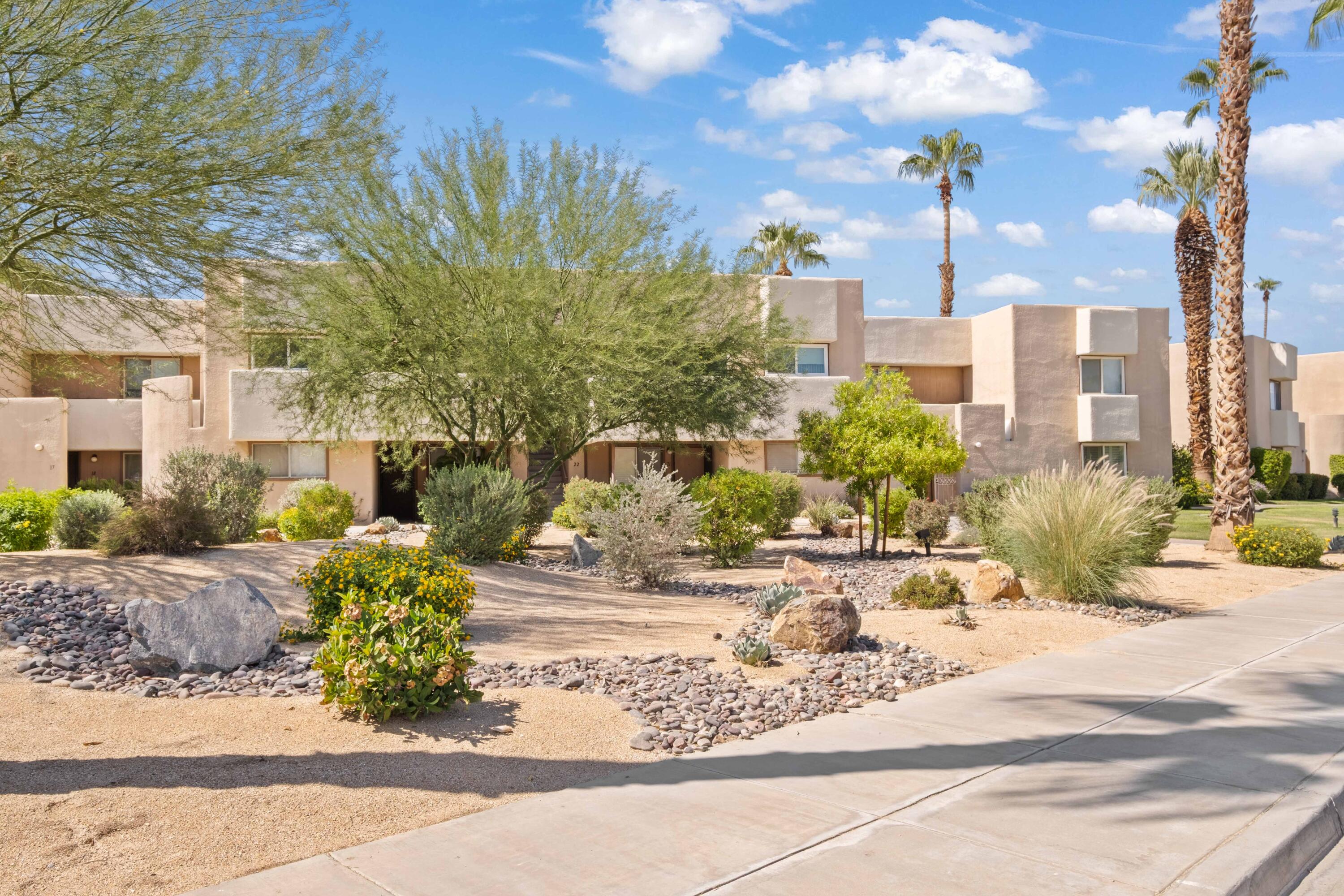 1268 Ramon Road, Unit 61 Palm Springs, CA 92264 - Photo 17 of 18 a view of a city with tall buildings