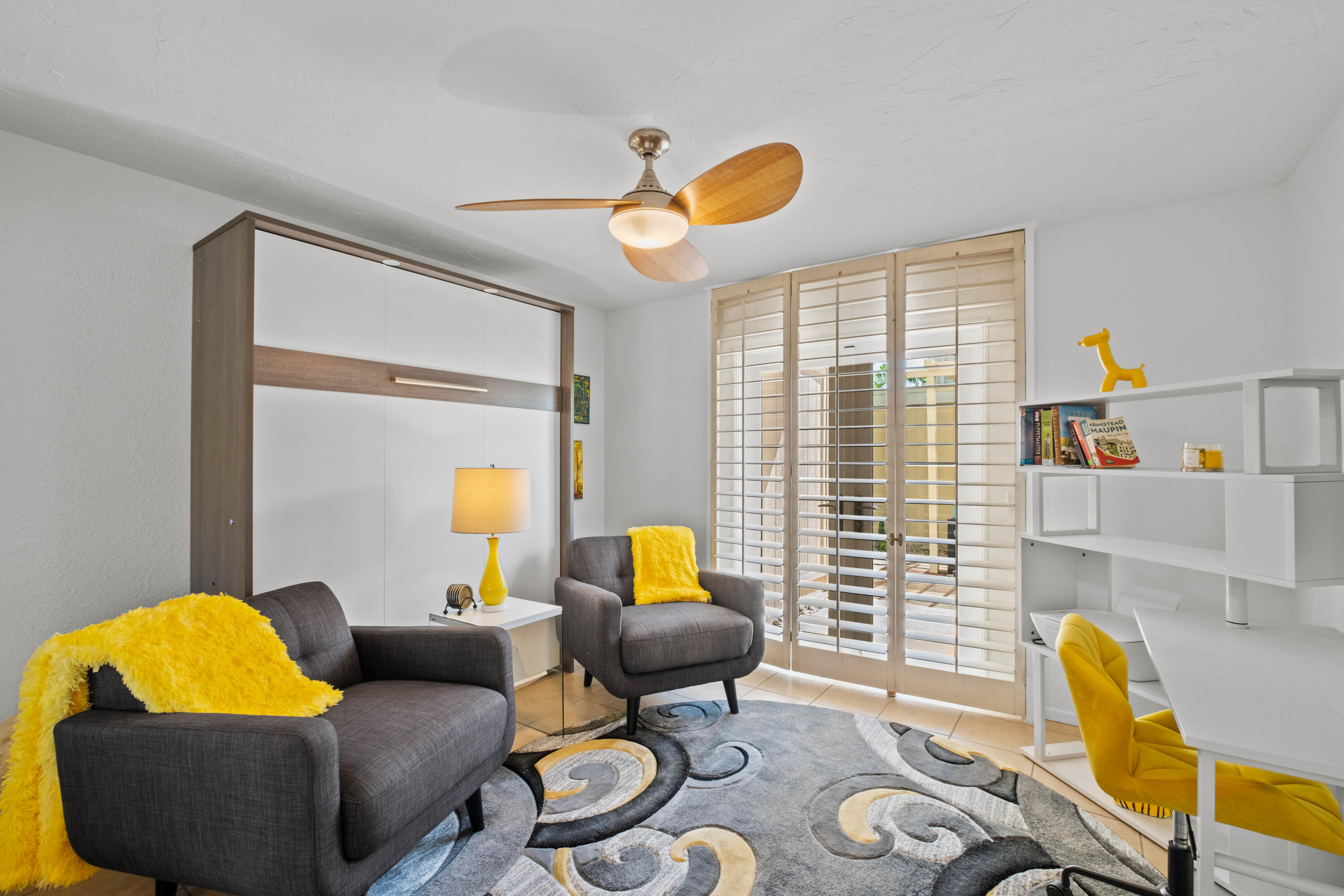 1268 Ramon Road, Unit 61 Palm Springs, CA 92264 - Photo 10 of 18 a living room with furniture and a window