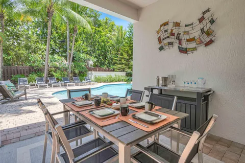 a view of a patio with furniture