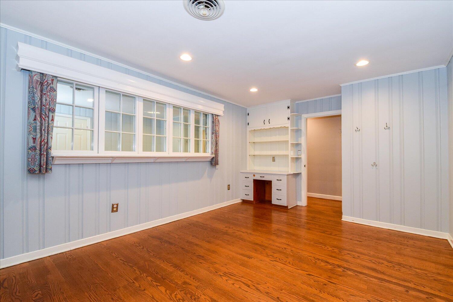 3060 Sedgefield Road Southwest Roanoke, VA 24018 - Photo 14 of 39 a view of a livingroom with a kitchen and a window
