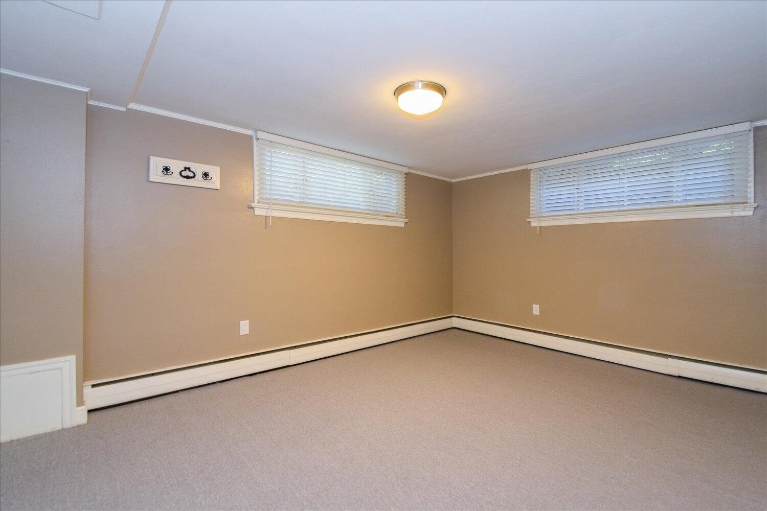 3060 Sedgefield Road Southwest Roanoke, VA 24018 - Photo 24 of 39 an empty room with a workbench