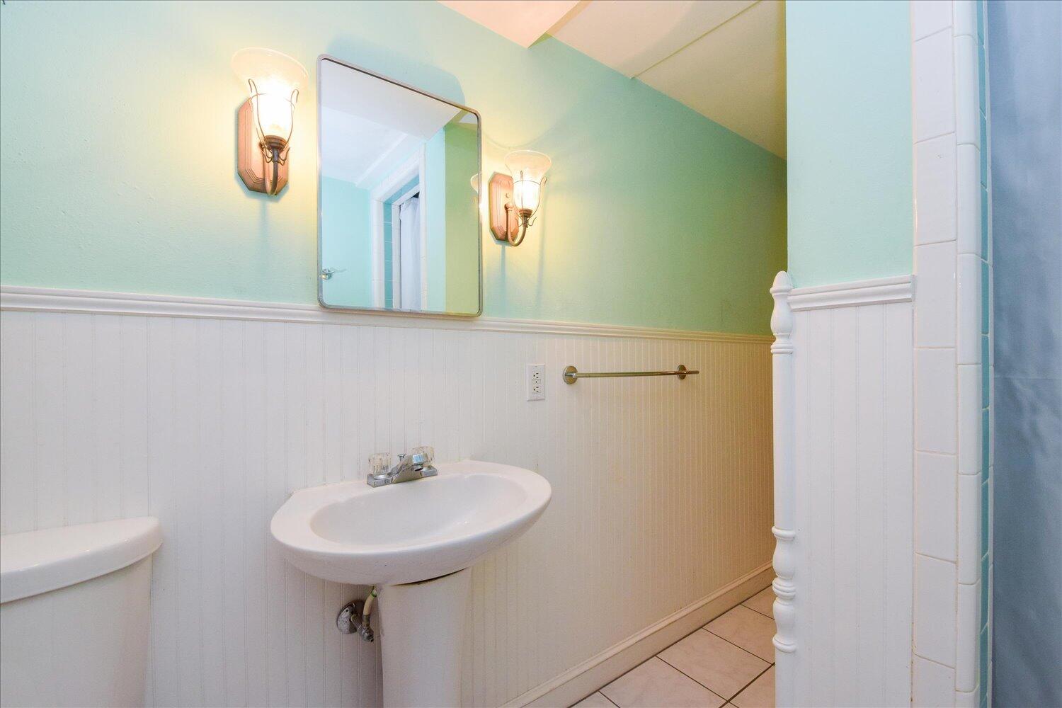 3060 Sedgefield Road Southwest Roanoke, VA 24018 - Photo 28 of 39 a bathroom with a sink and a mirror