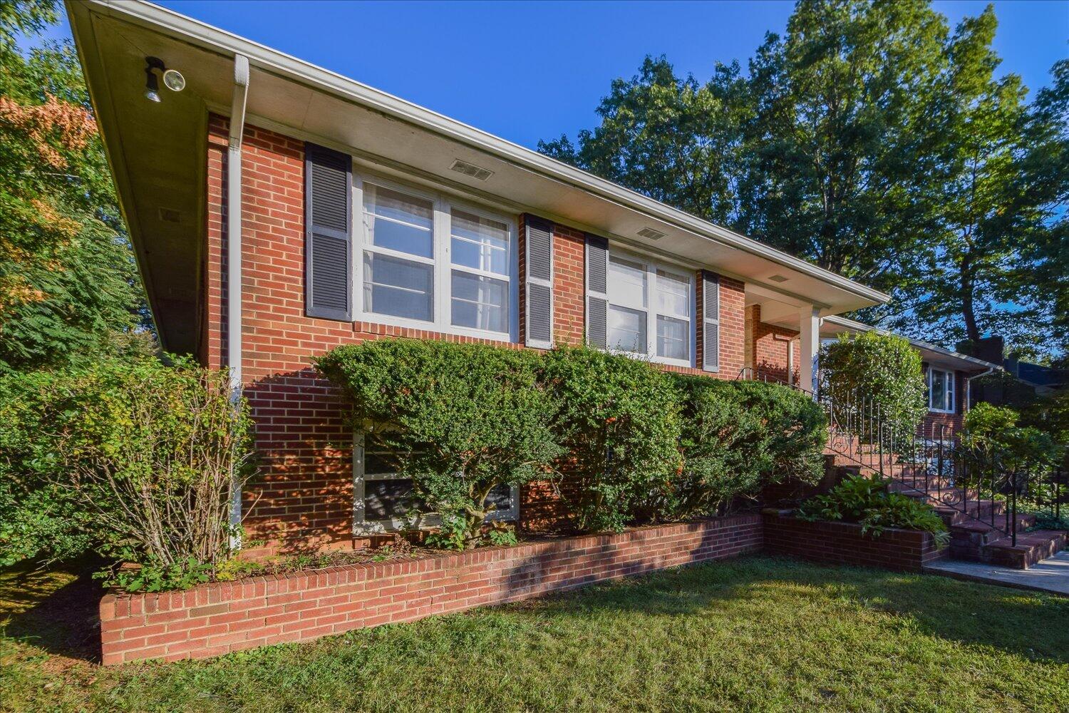 3060 Sedgefield Road Southwest Roanoke, VA 24018 - Photo 31 of 39 a front view of a house with a yard