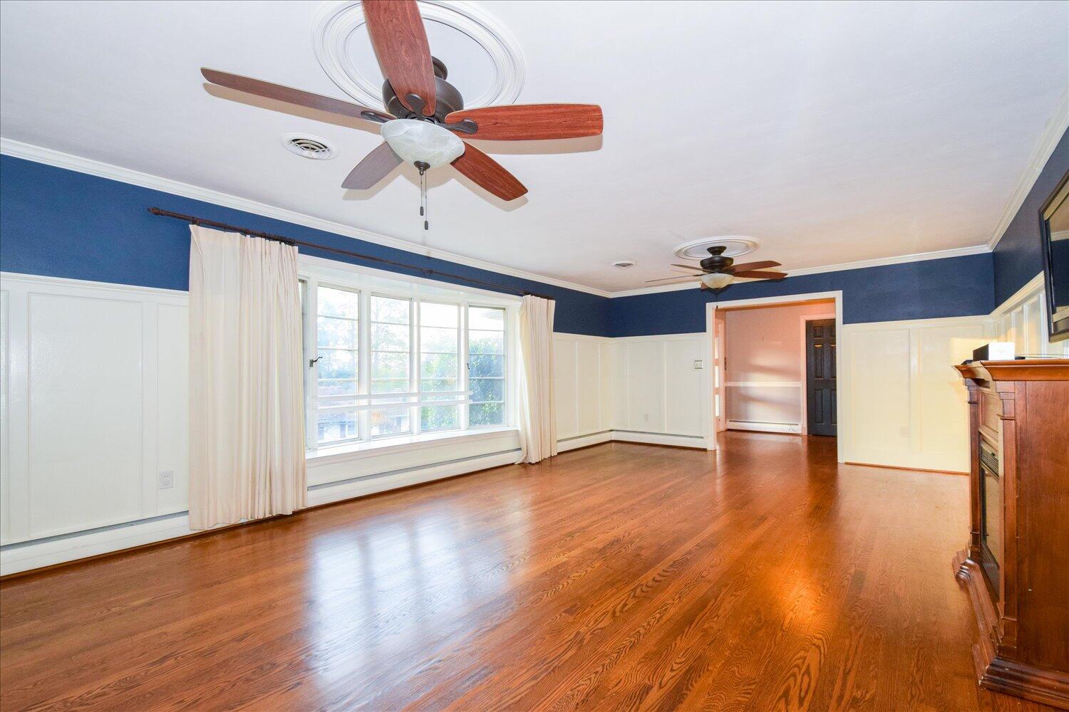 3060 Sedgefield Road Southwest Roanoke, VA 24018 - Photo 5 of 39 a view of empty room with wooden floor and fan