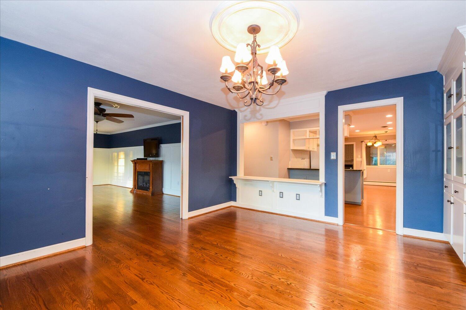 3060 Sedgefield Road Southwest Roanoke, VA 24018 - Photo 8 of 39 a view of an empty room with window and wooden floor