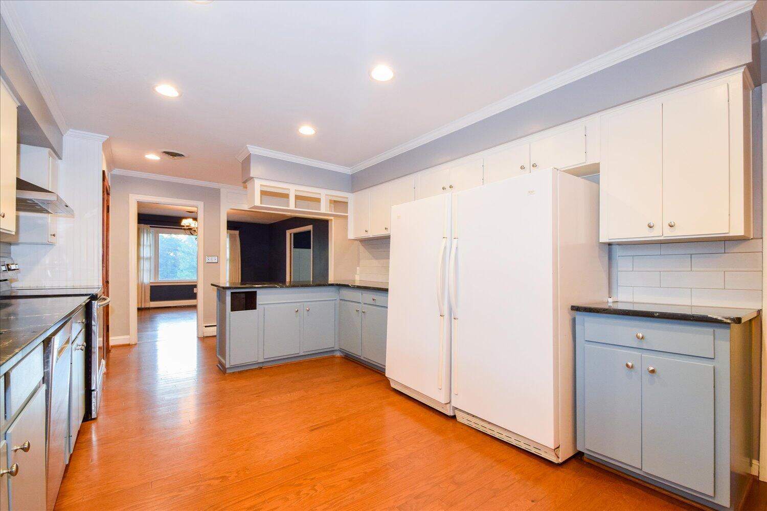 3060 Sedgefield Road Southwest Roanoke, VA 24018 - Photo 10 of 39 a large kitchen with a large counter top appliances and cabinets