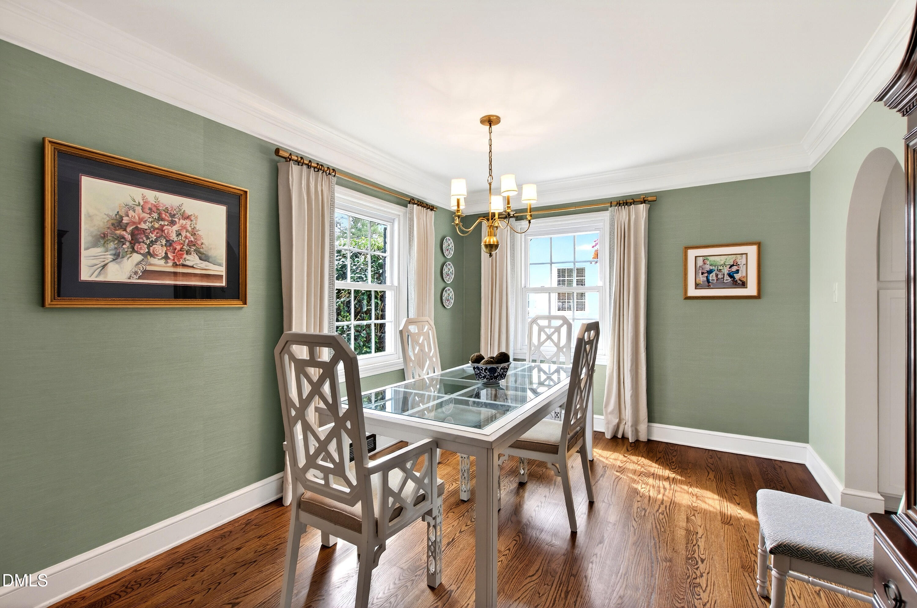 1205 Canterbury Road Raleigh, NC 27608 - Photo 8 of 48 a view of a dining room with furniture window and wooden floor