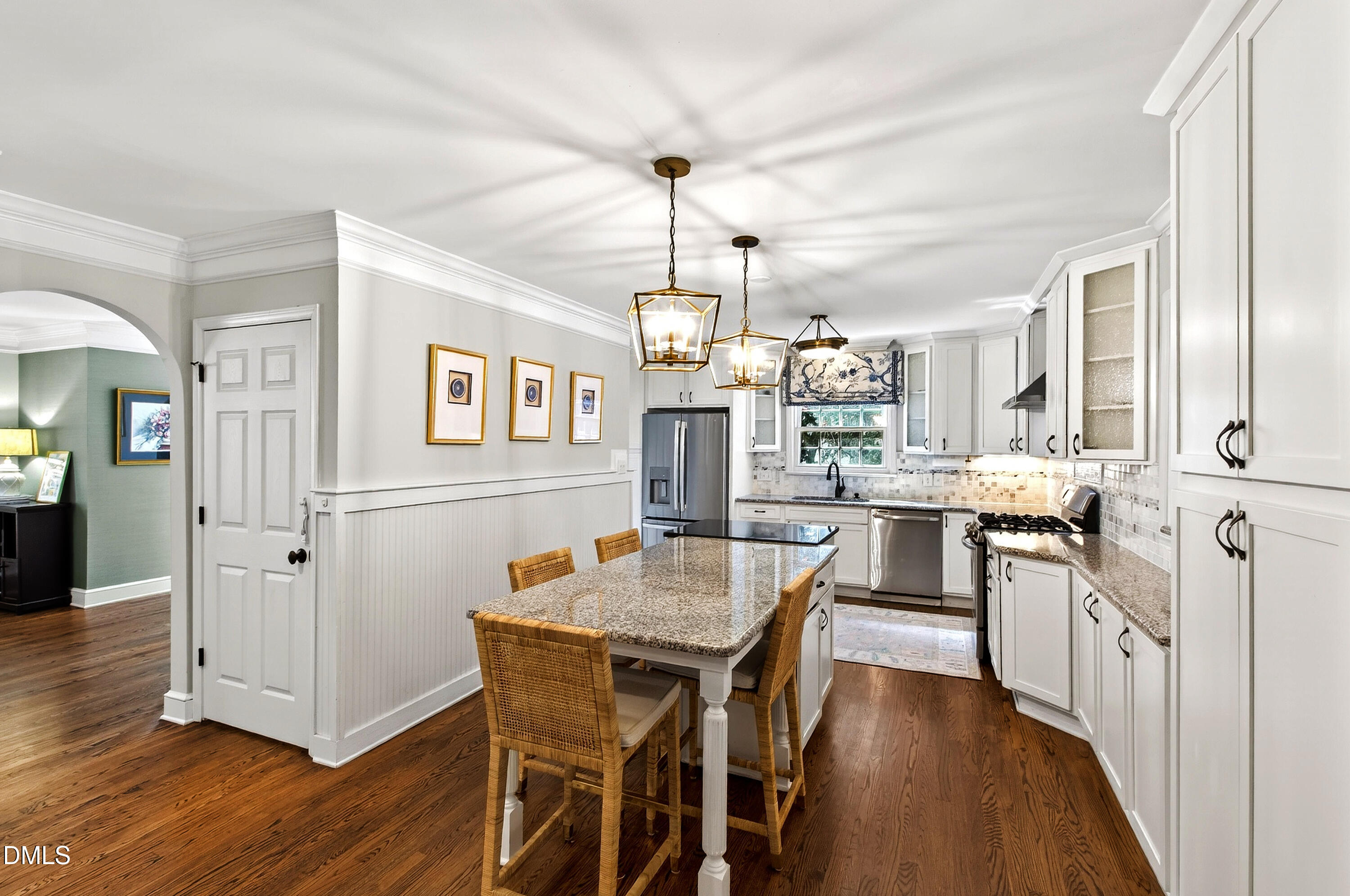 1205 Canterbury Road Raleigh, NC 27608 - Photo 12 of 48 a view of a dining room with furniture window and wooden floor