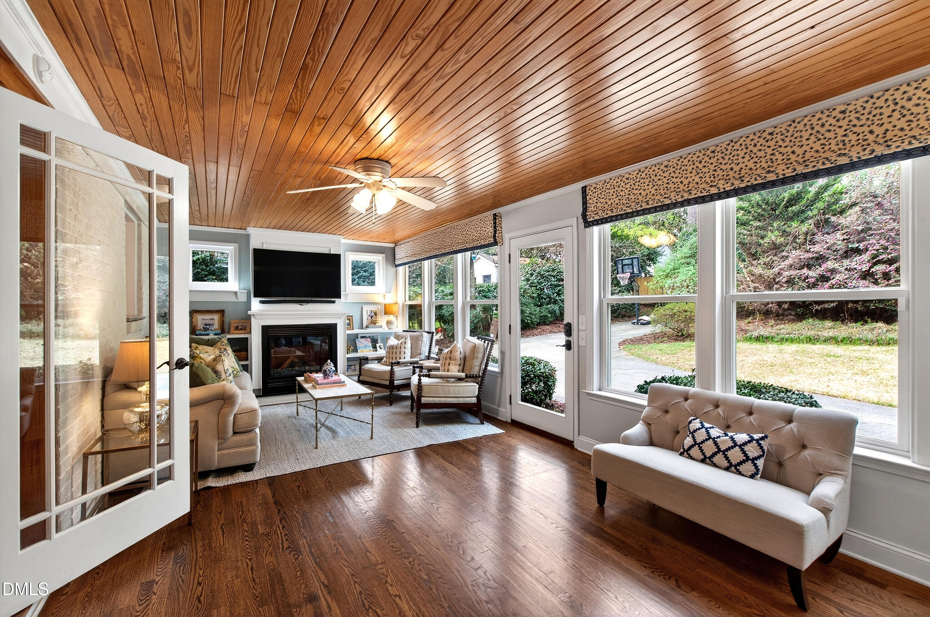 1205 Canterbury Road Raleigh, NC 27608 - Photo 19 of 48 a living room with furniture and a fireplace