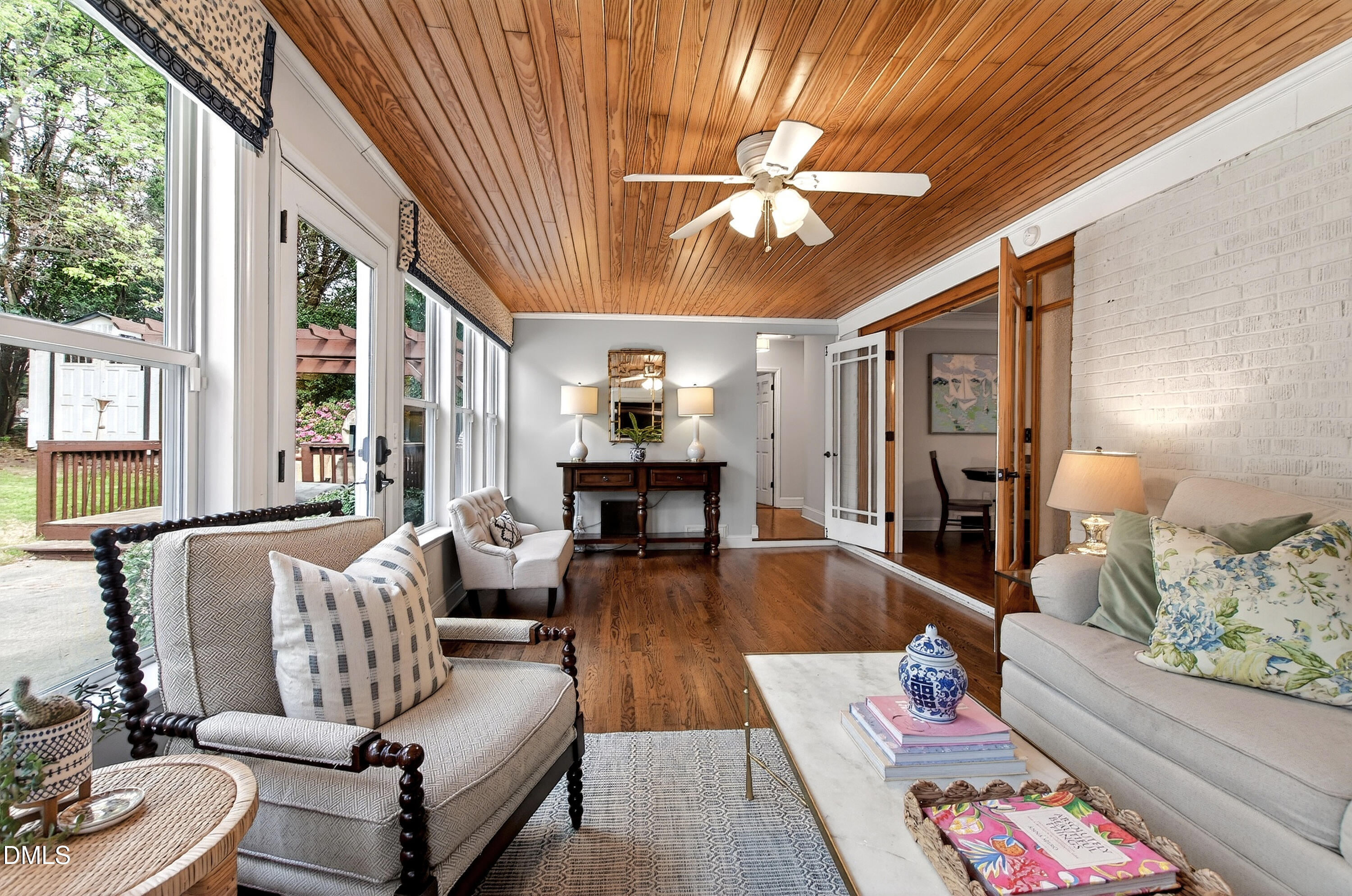 1205 Canterbury Road Raleigh, NC 27608 - Photo 21 of 48 a living room with furniture and a large window