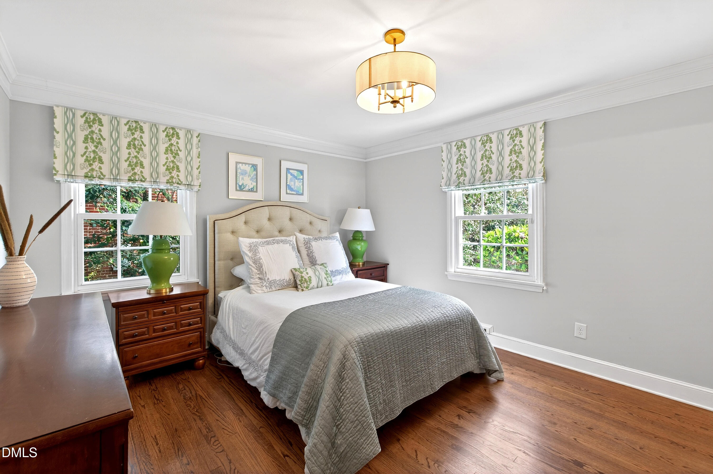 1205 Canterbury Road Raleigh, NC 27608 - Photo 22 of 48 a bedroom with a bed and a window