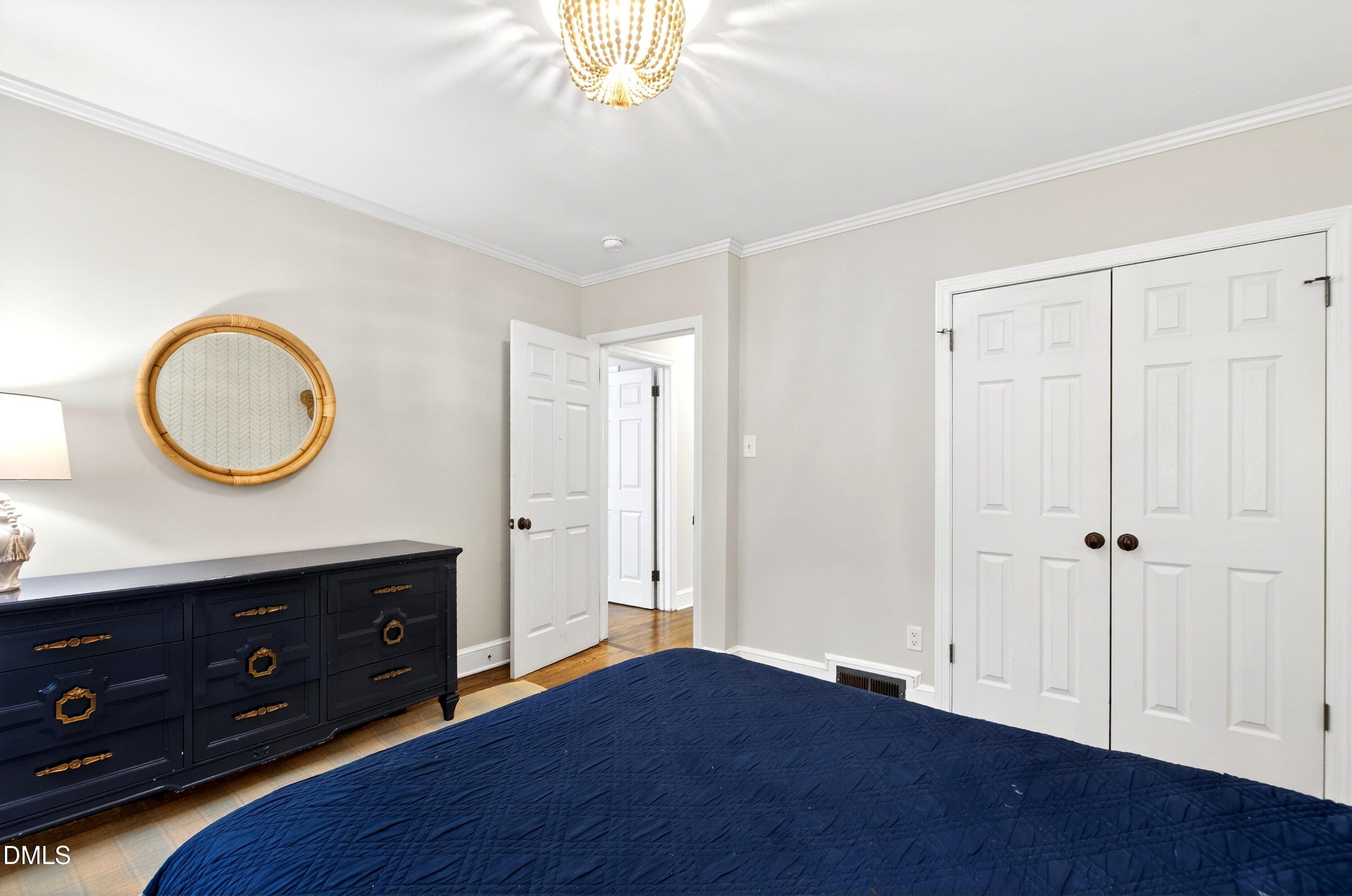 1205 Canterbury Road Raleigh, NC 27608 - Photo 29 of 48 a view of a room with wooden floor and cabinet