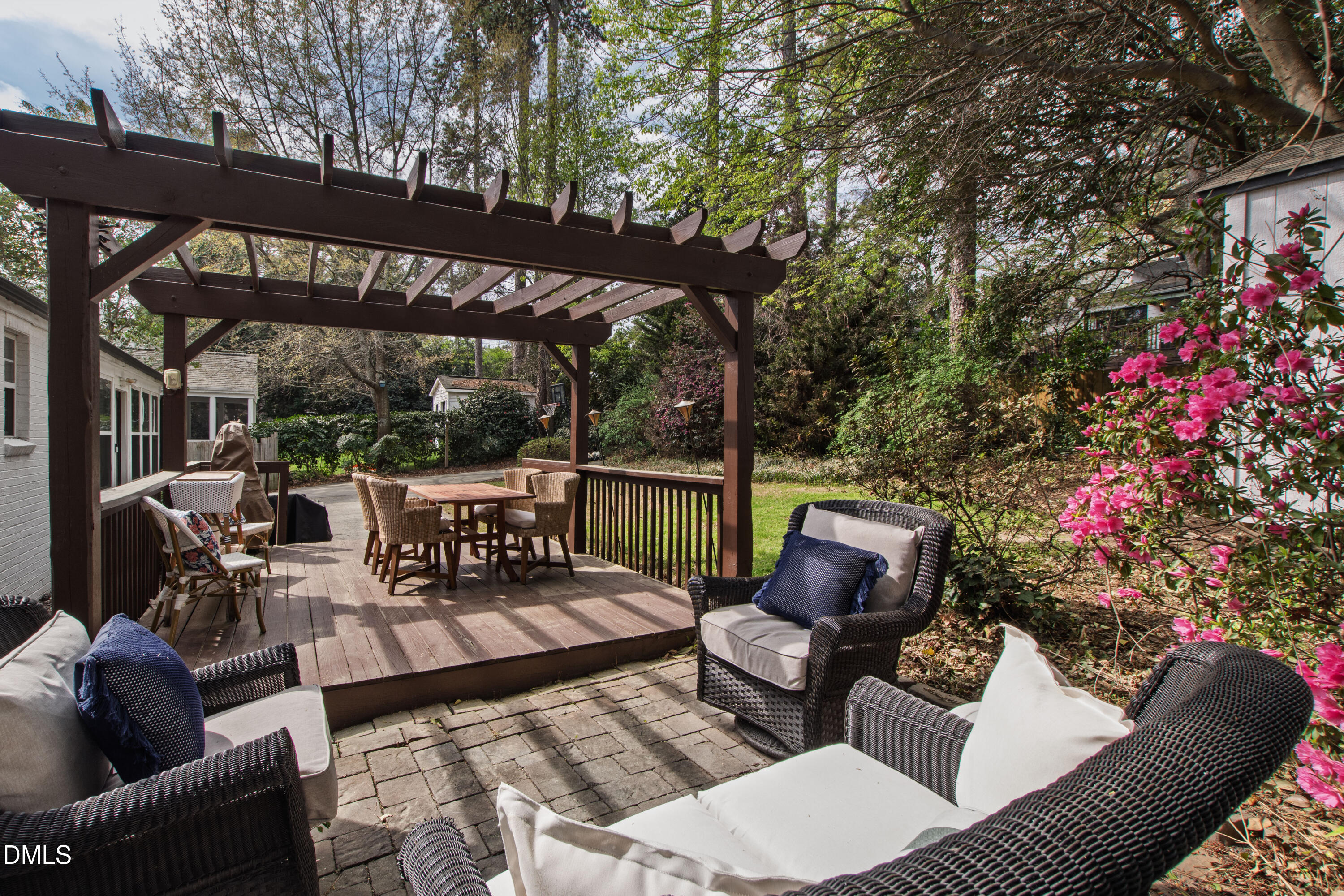 1205 Canterbury Road Raleigh, NC 27608 - Photo 40 of 48 a outdoor living room with furniture and garden view