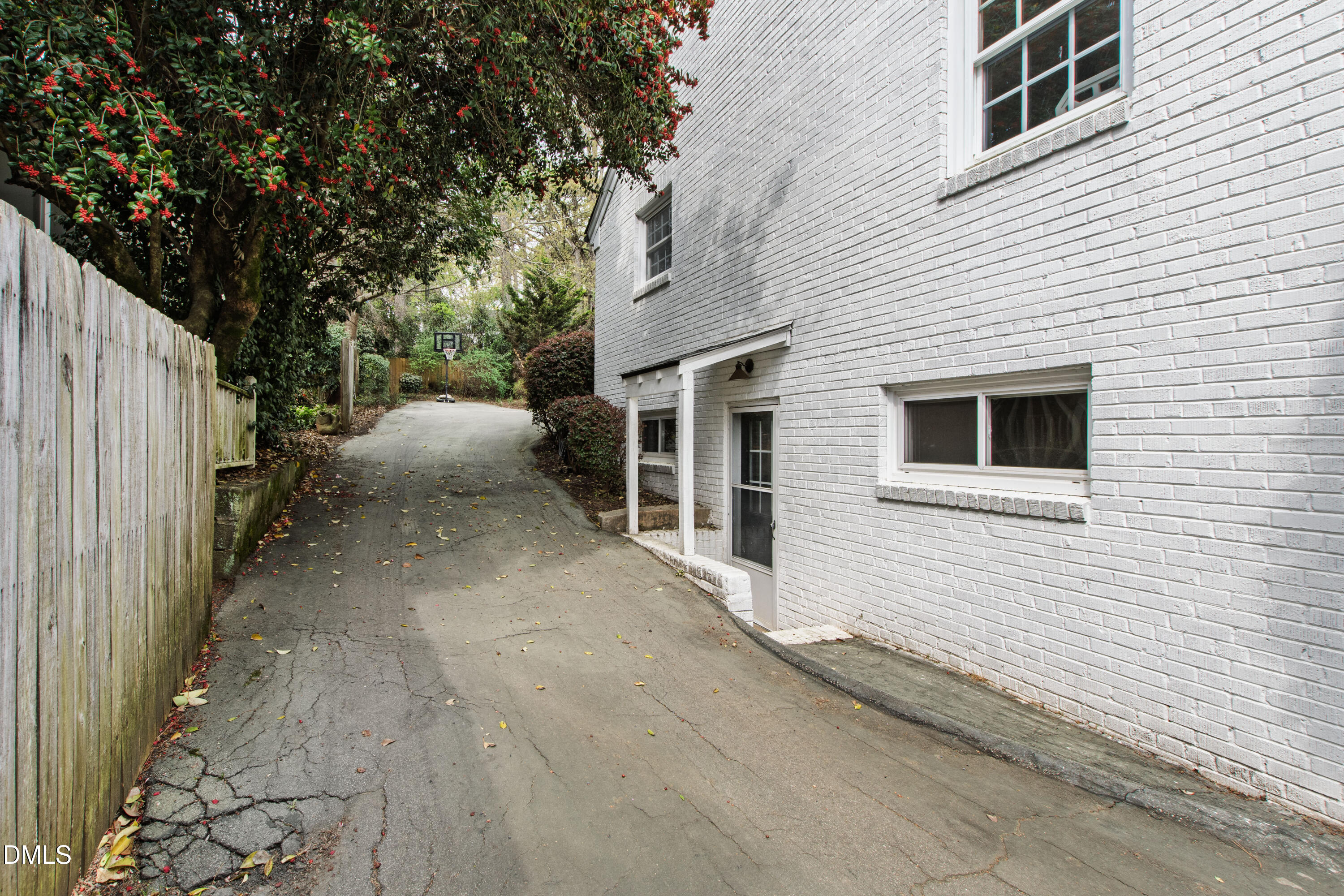 1205 Canterbury Road Raleigh, NC 27608 - Photo 42 of 48 a view of a house with a backyard