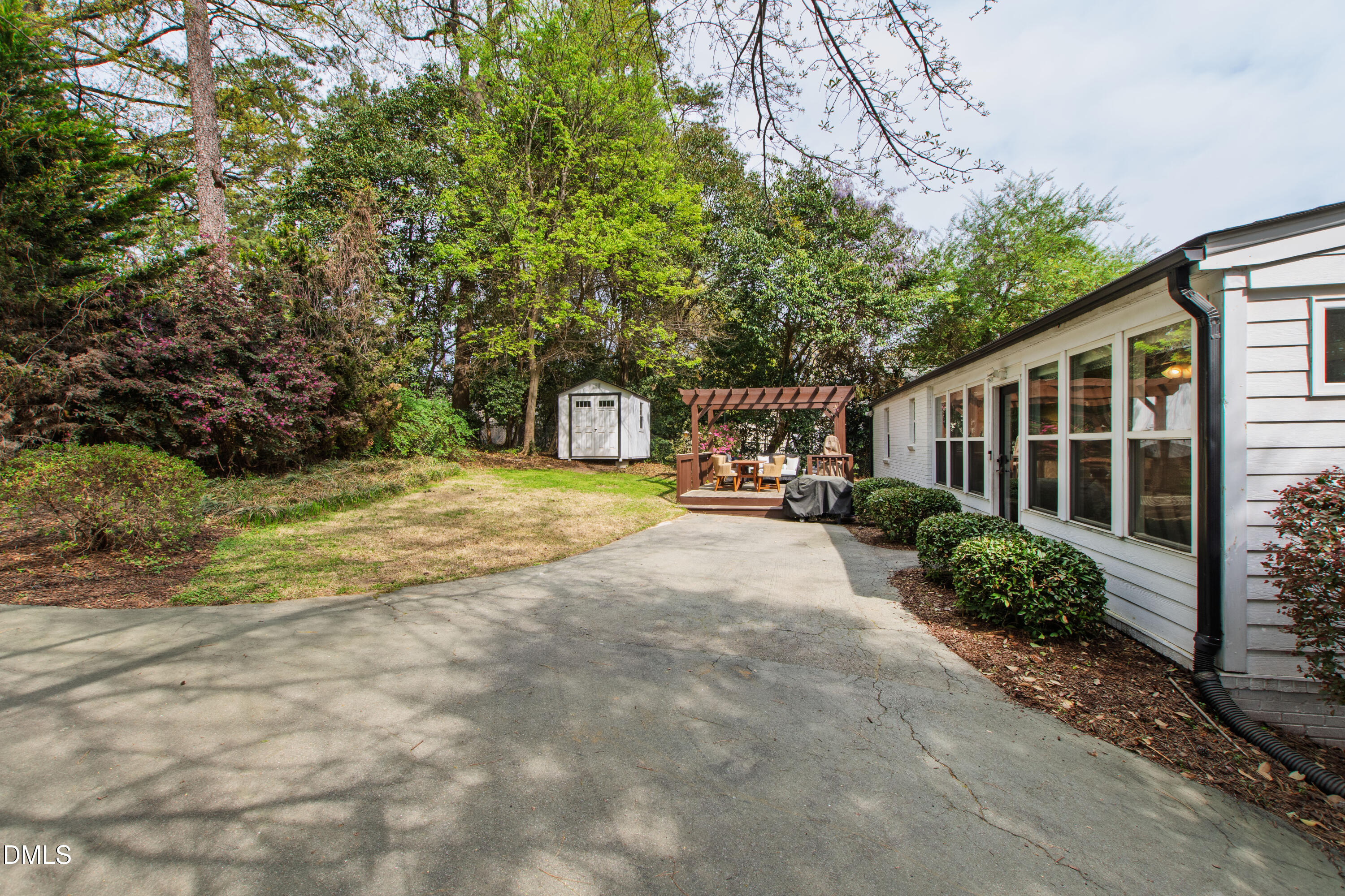 1205 Canterbury Road Raleigh, NC 27608 - Photo 43 of 48 a view of house with outdoor space and swimming pool