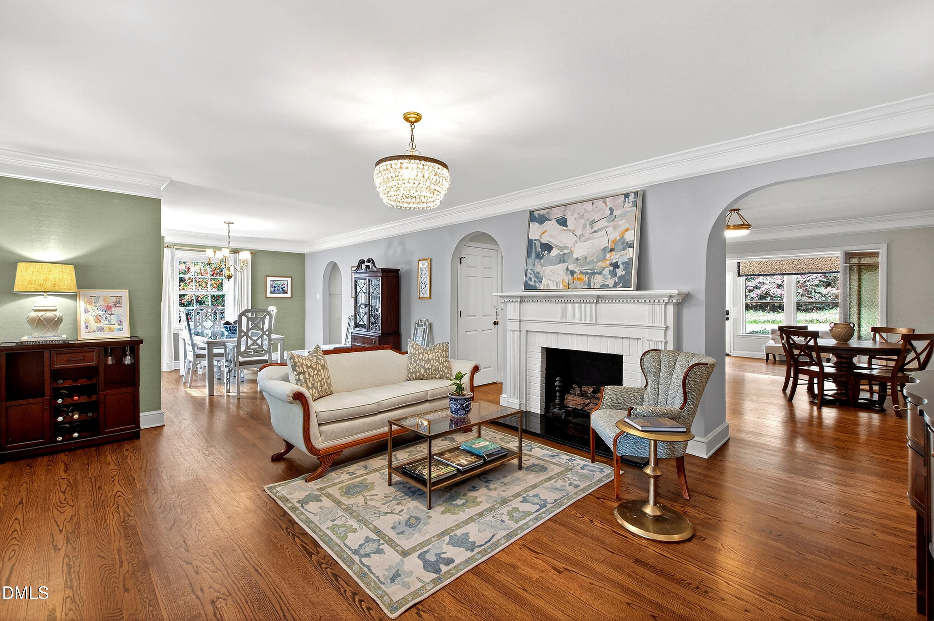 1205 Canterbury Road Raleigh, NC 27608 - Photo 6 of 48 a living room with furniture and a fireplace