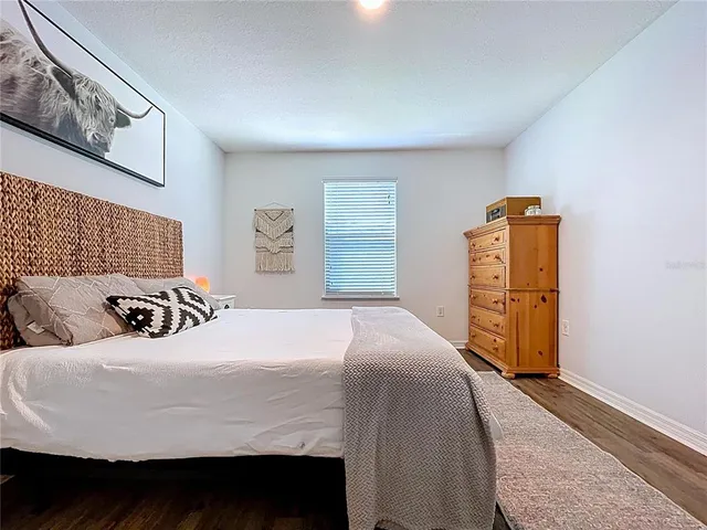 a bathroom with a shower and a toilet