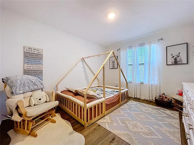 a view of a swimming pool with a yard