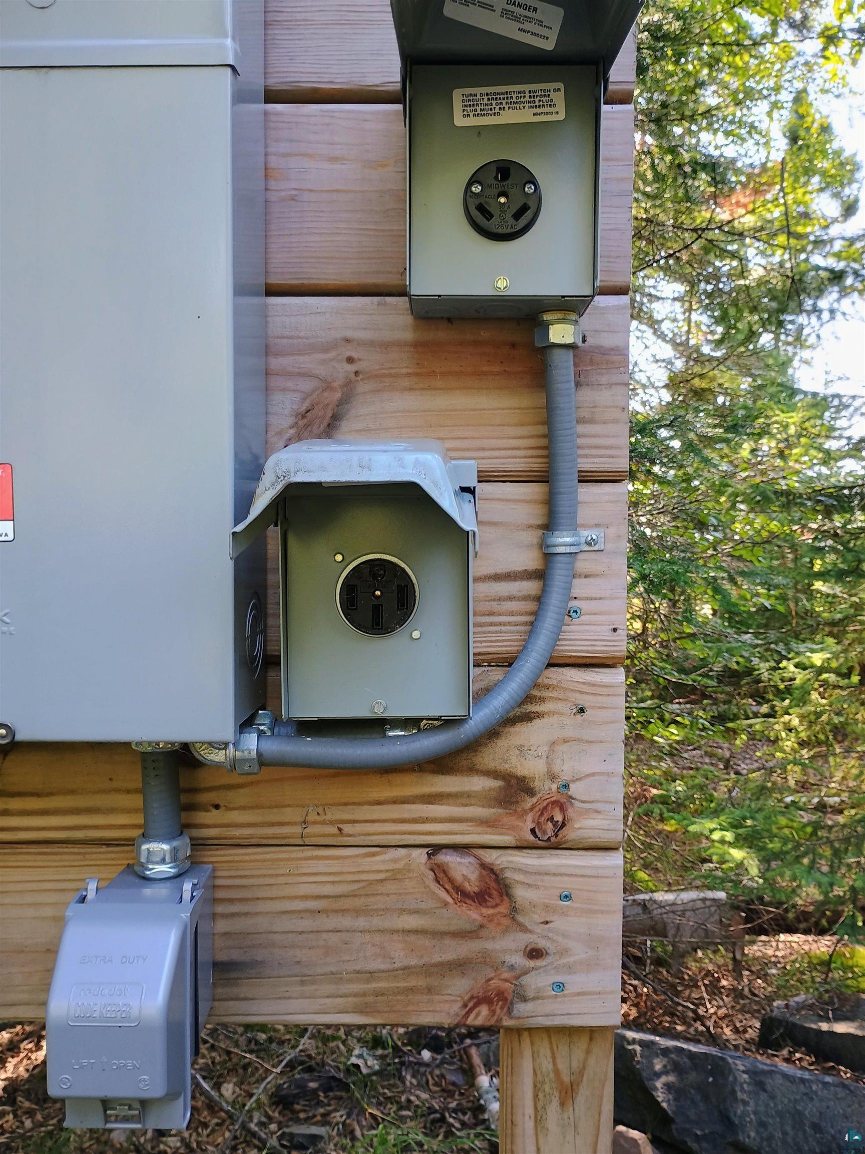 188 Stonegate Road Hovland, MN 55606 - Photo 23 of 33 30 amp and 50 amp plugs