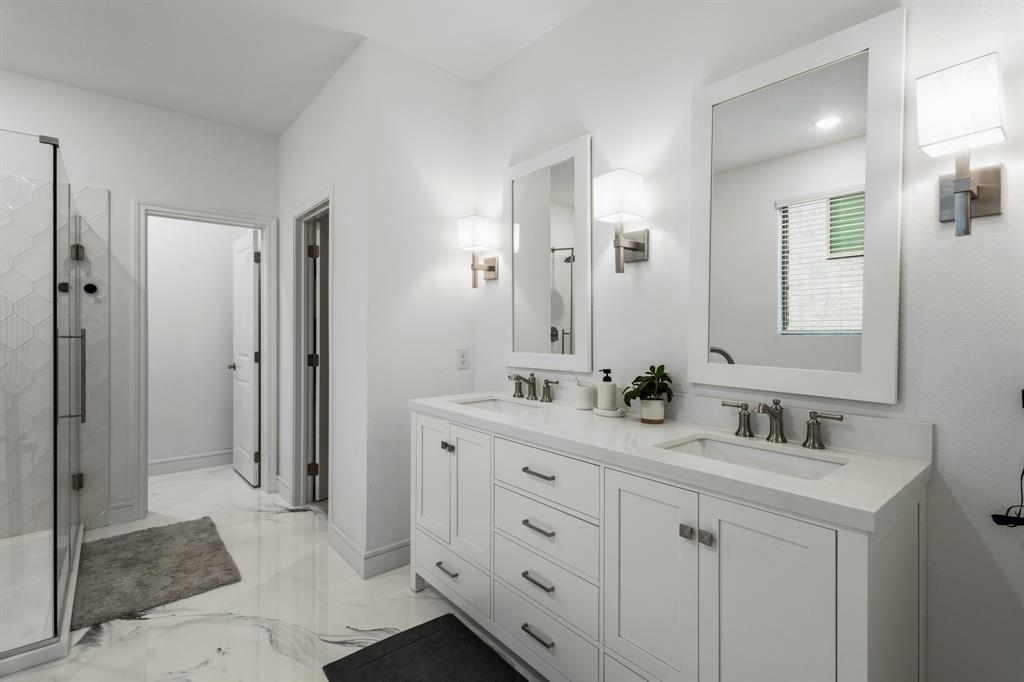 1926 Honey Crk Road Forney, TX 75126 - Photo 16 of 29 a bathroom with a double vanity sink mirror and double